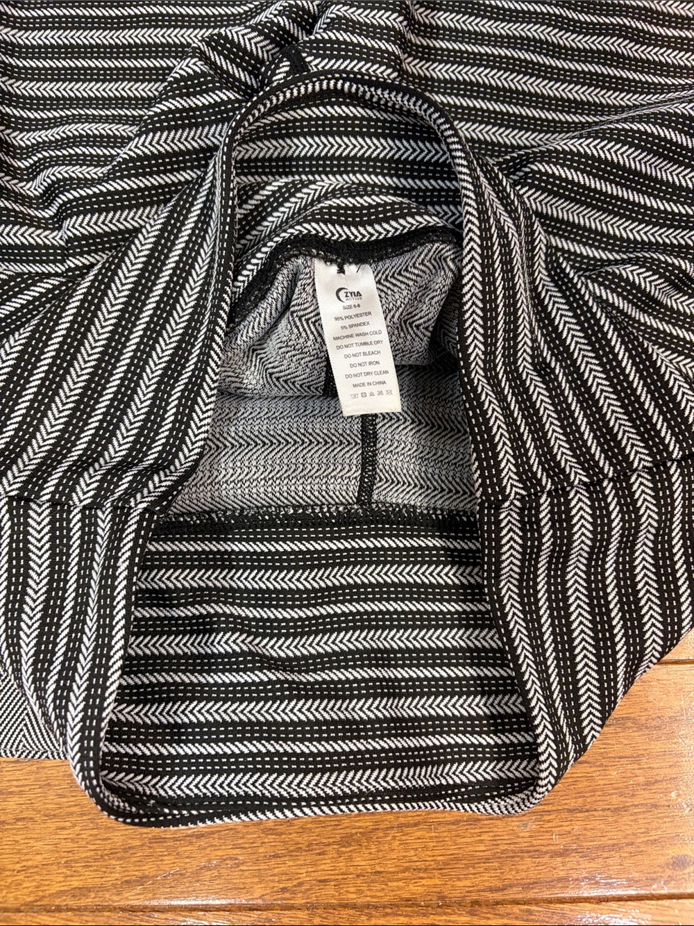 216. ZYIA women’s leggings 2 pair bundle herringbone size 6 and 8 - Picture 2 of 5